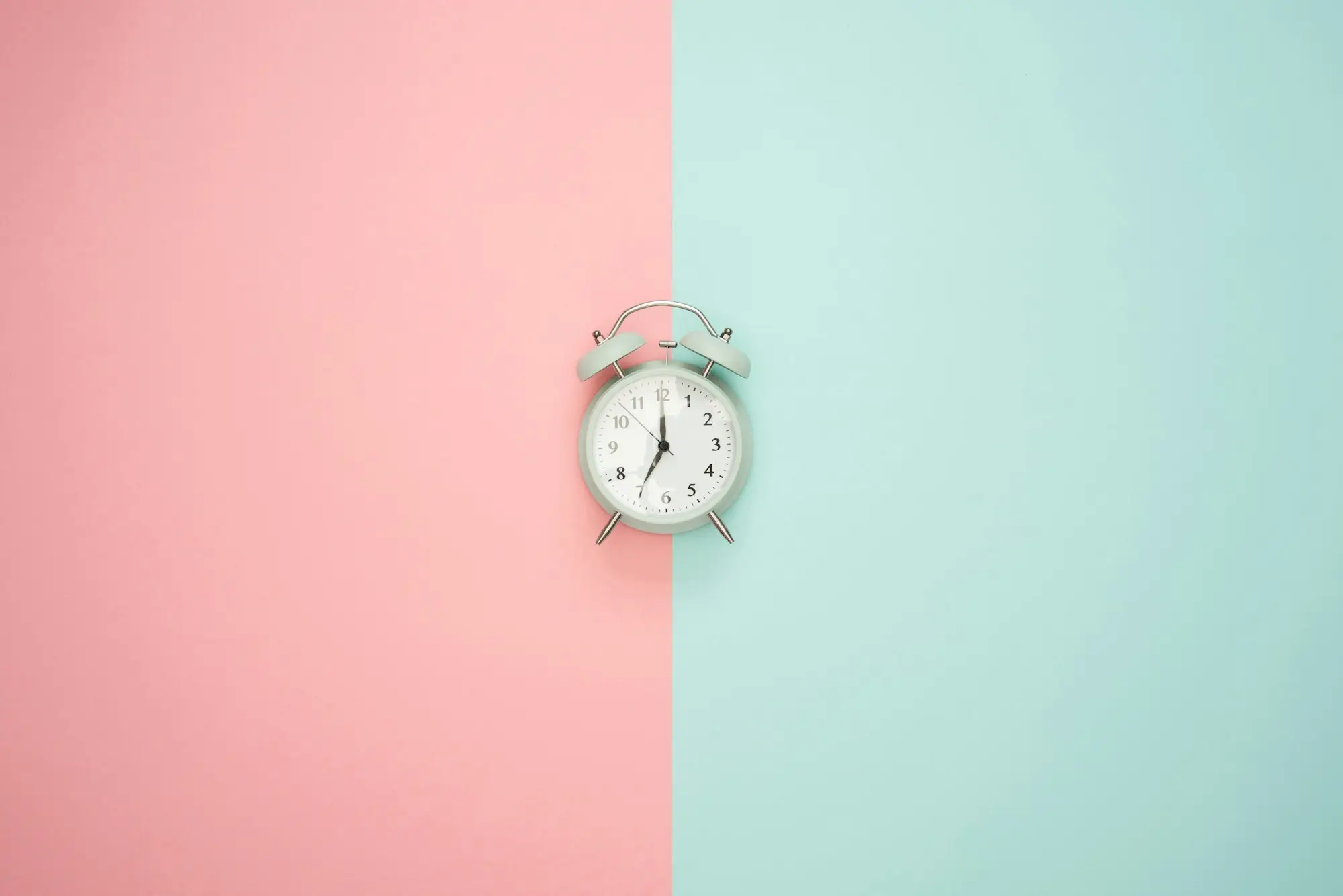 Silver bell alarm clock, representing getting ready for fast business funding