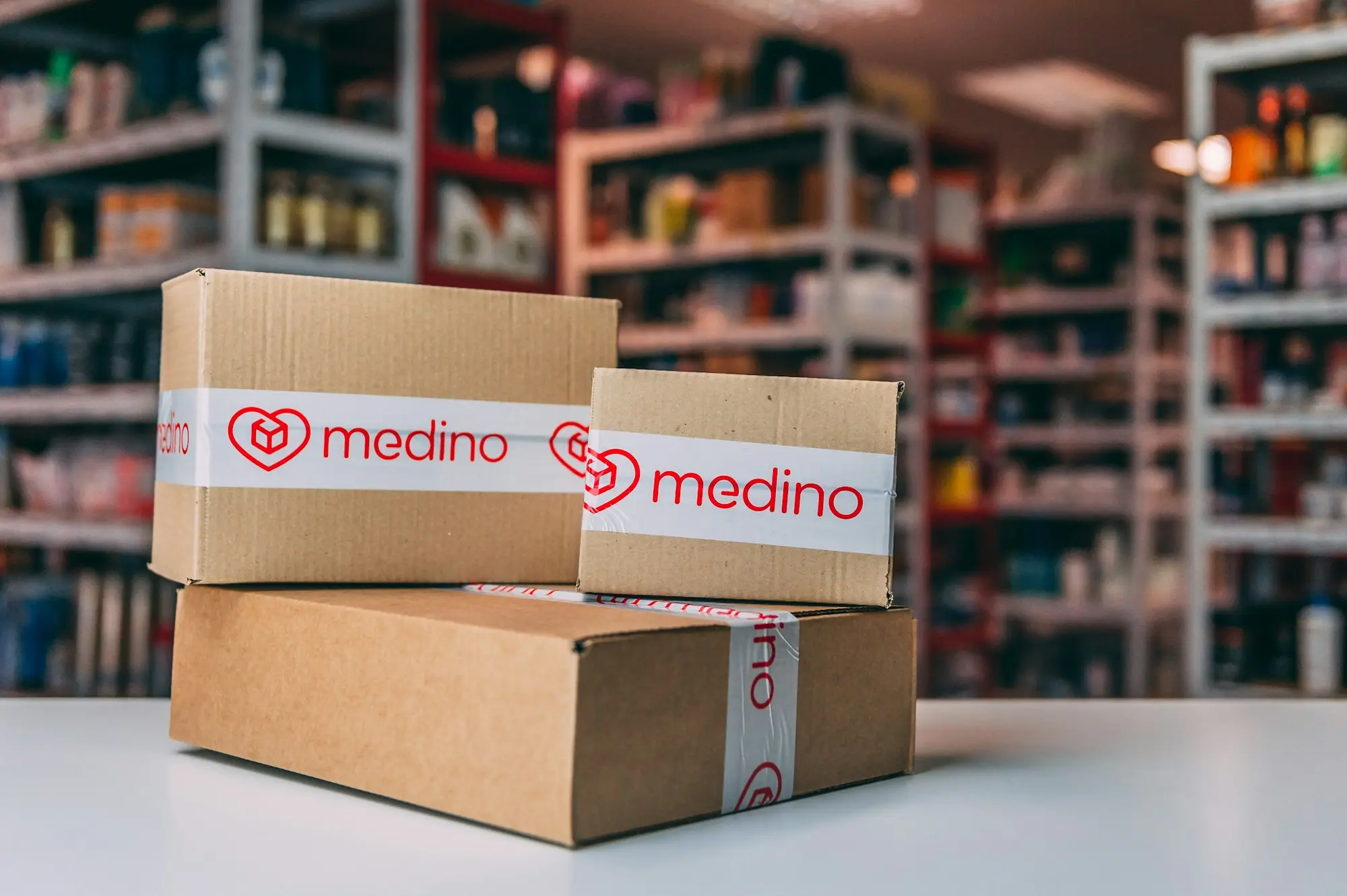 Stacked cardboard boxes of stock ready to ship for an online store